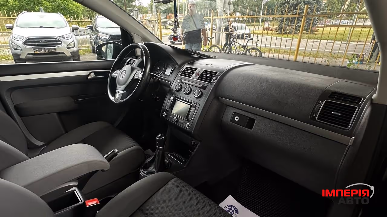 Volkswagen Touran - фото 7