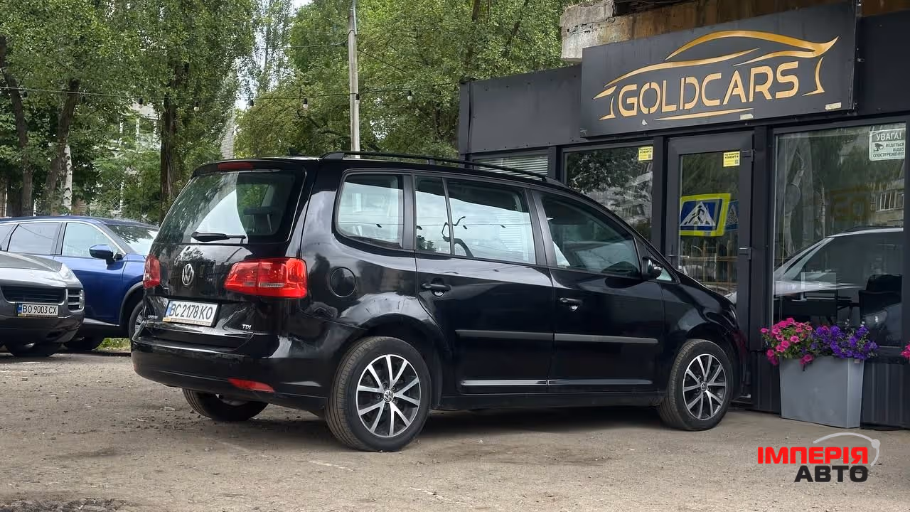 Volkswagen Touran - фото 2