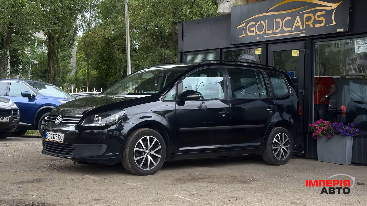 Volkswagen Touran - фото 10