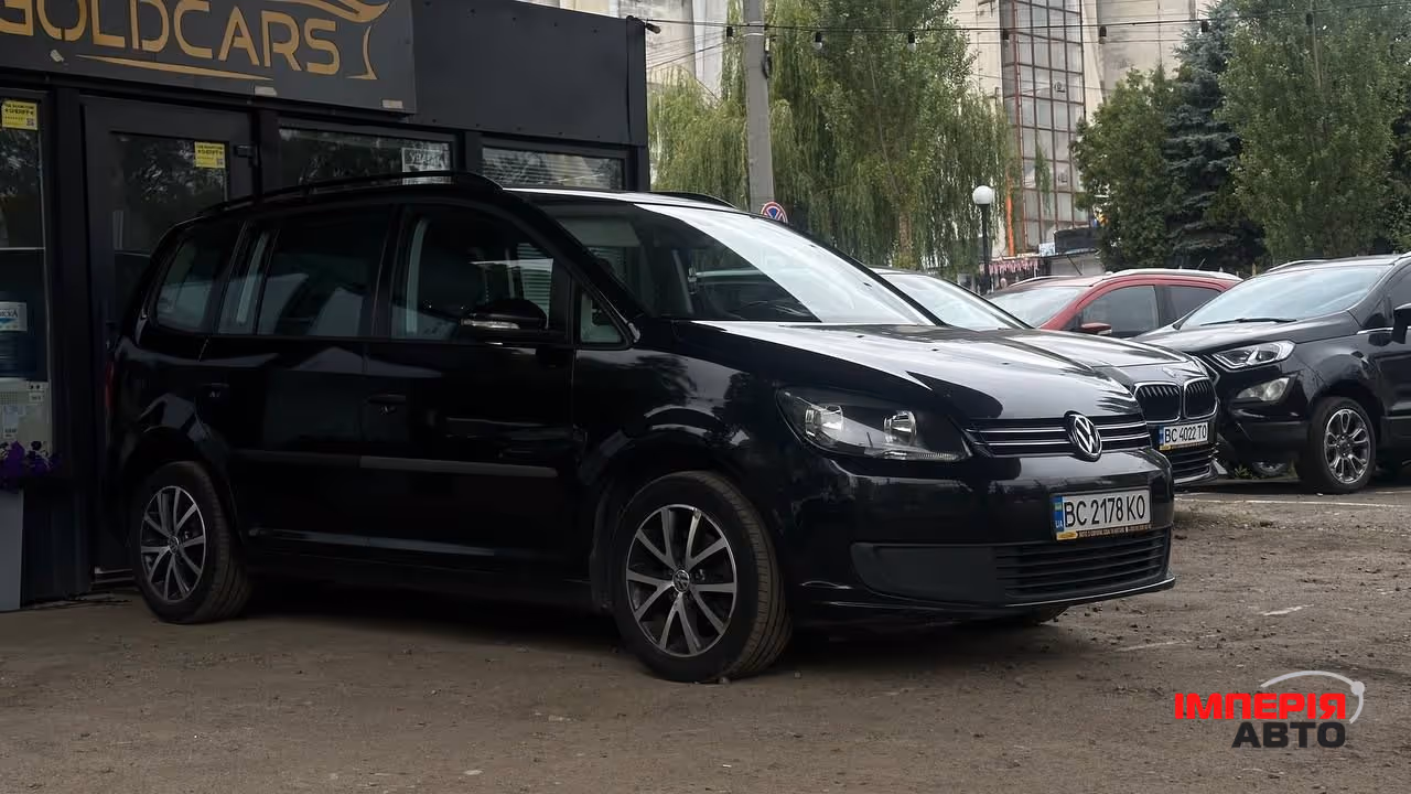 Volkswagen Touran - фото 8