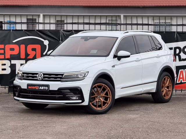 Volkswagen Tiguan - фото 1