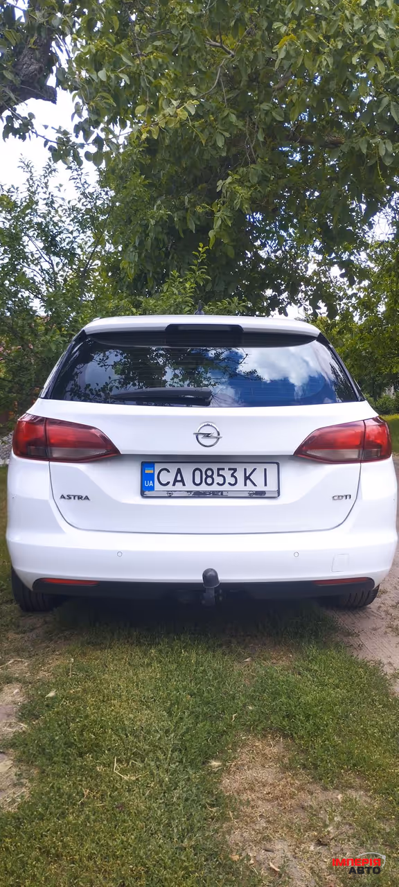 Opel Astra - фото 4