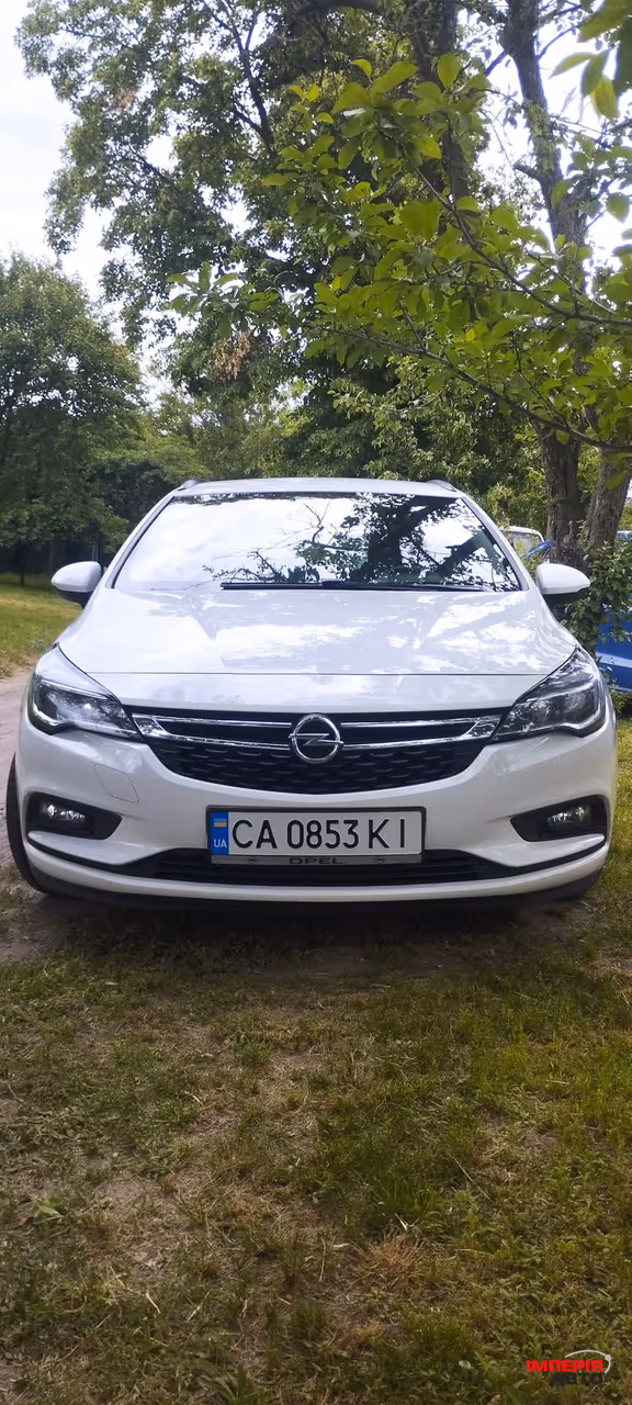 Opel Astra - фото 7