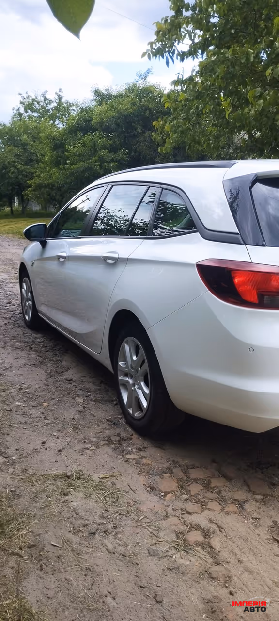 Opel Astra - фото 8