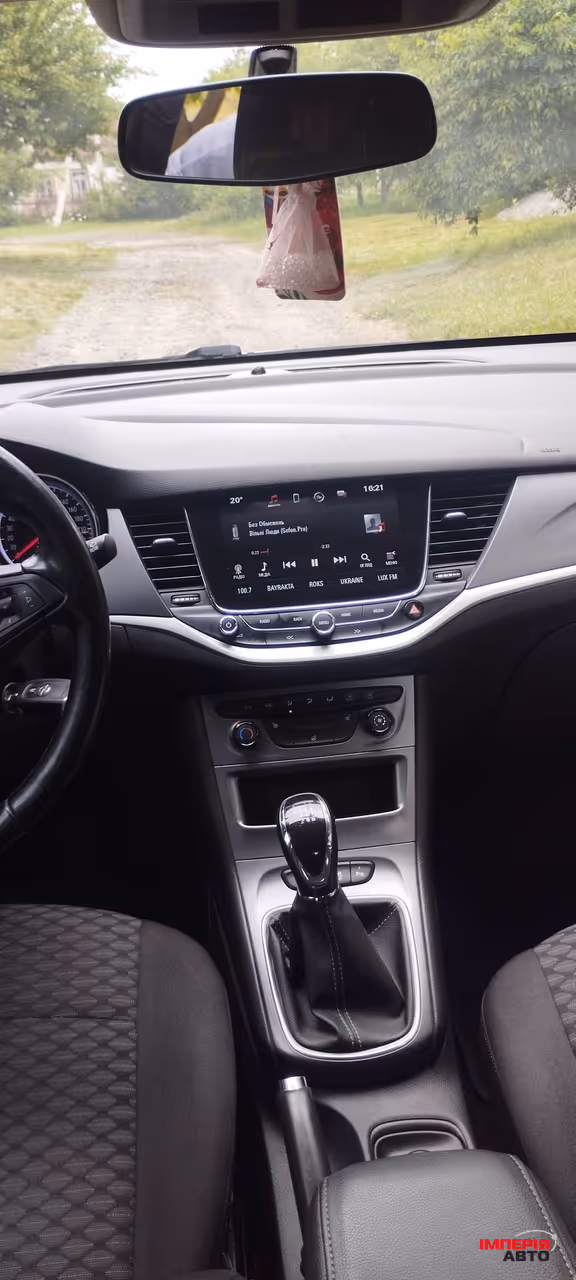 Opel Astra - фото 12
