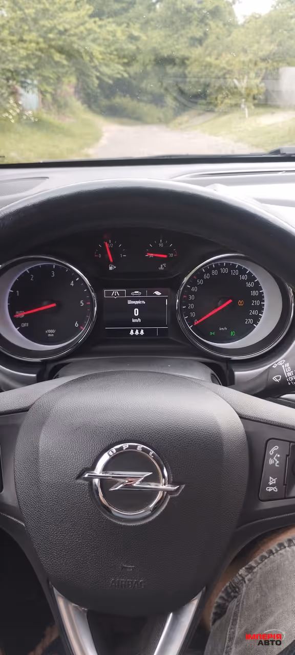 Opel Astra - фото 11