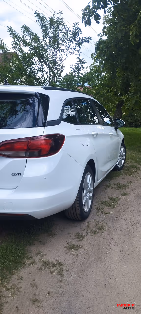 Opel Astra - фото 5