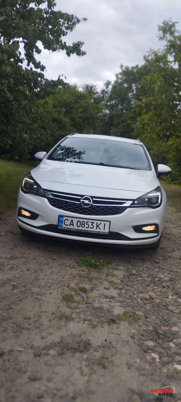 Opel Astra - фото 1