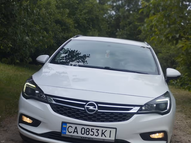 Opel Astra - фото 1