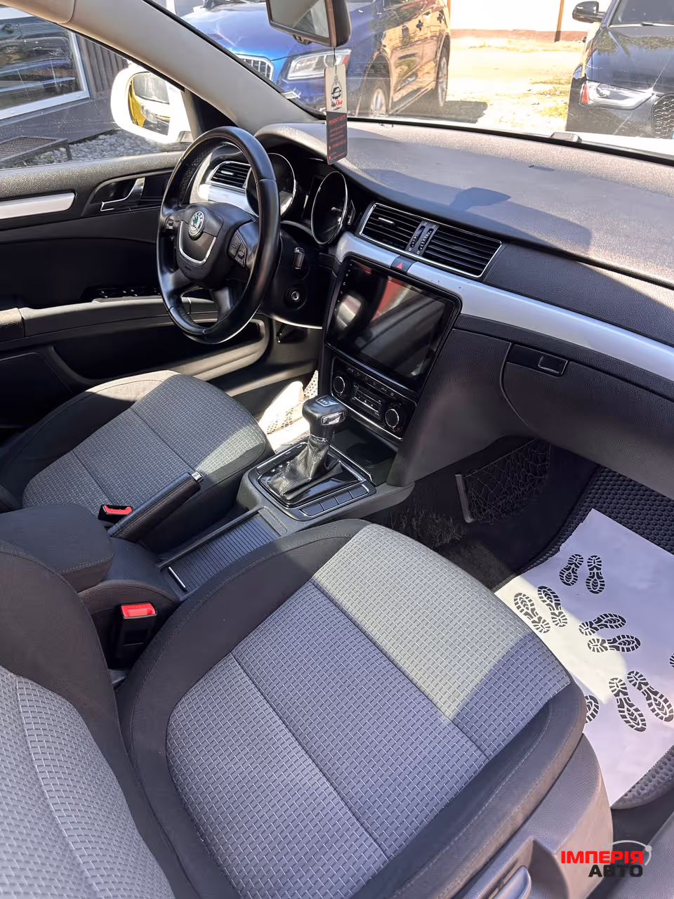 Skoda Superb - фото 11