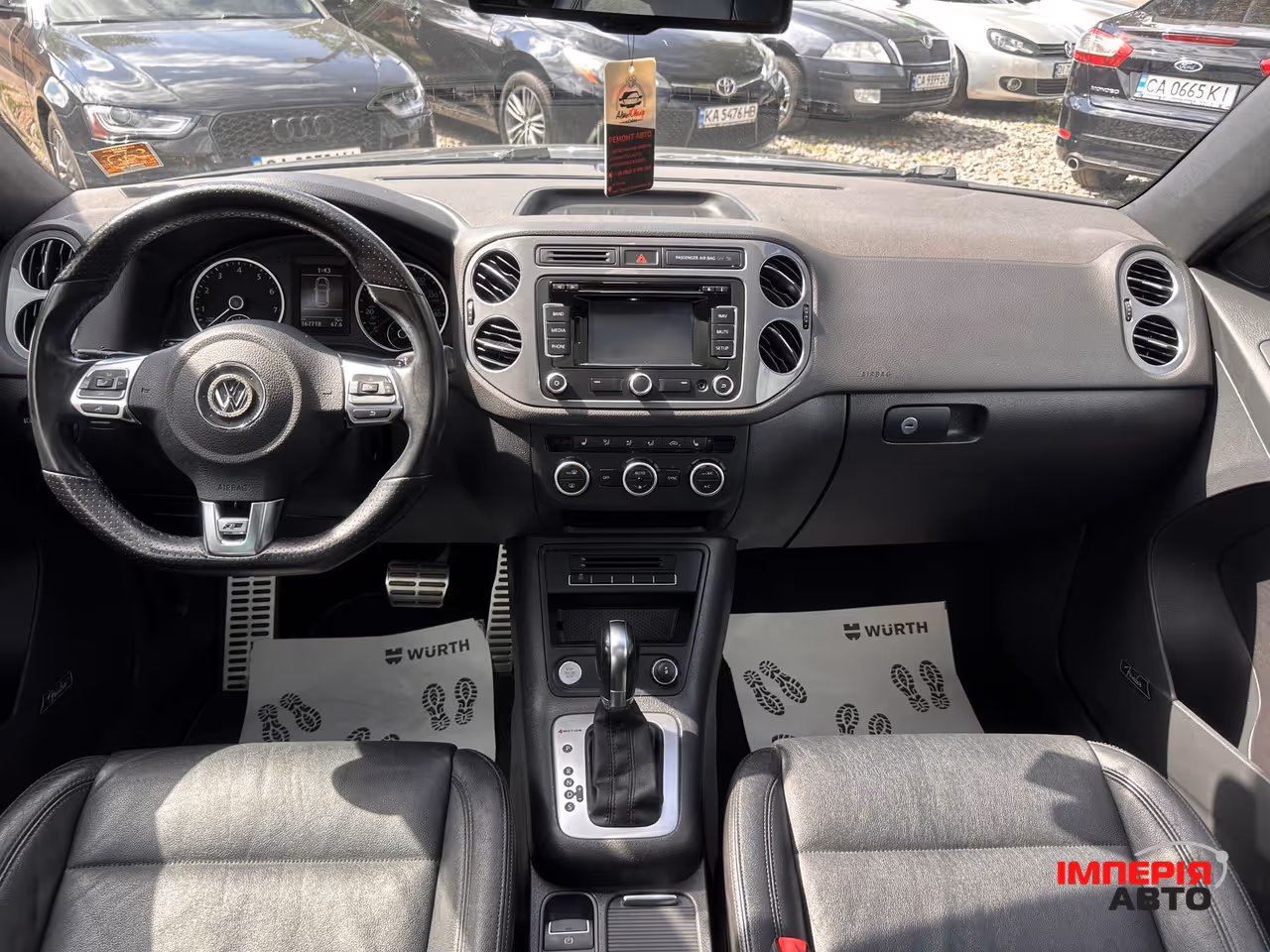 Volkswagen Tiguan - фото 4