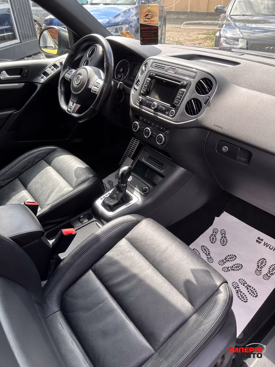 Volkswagen Tiguan - фото 8