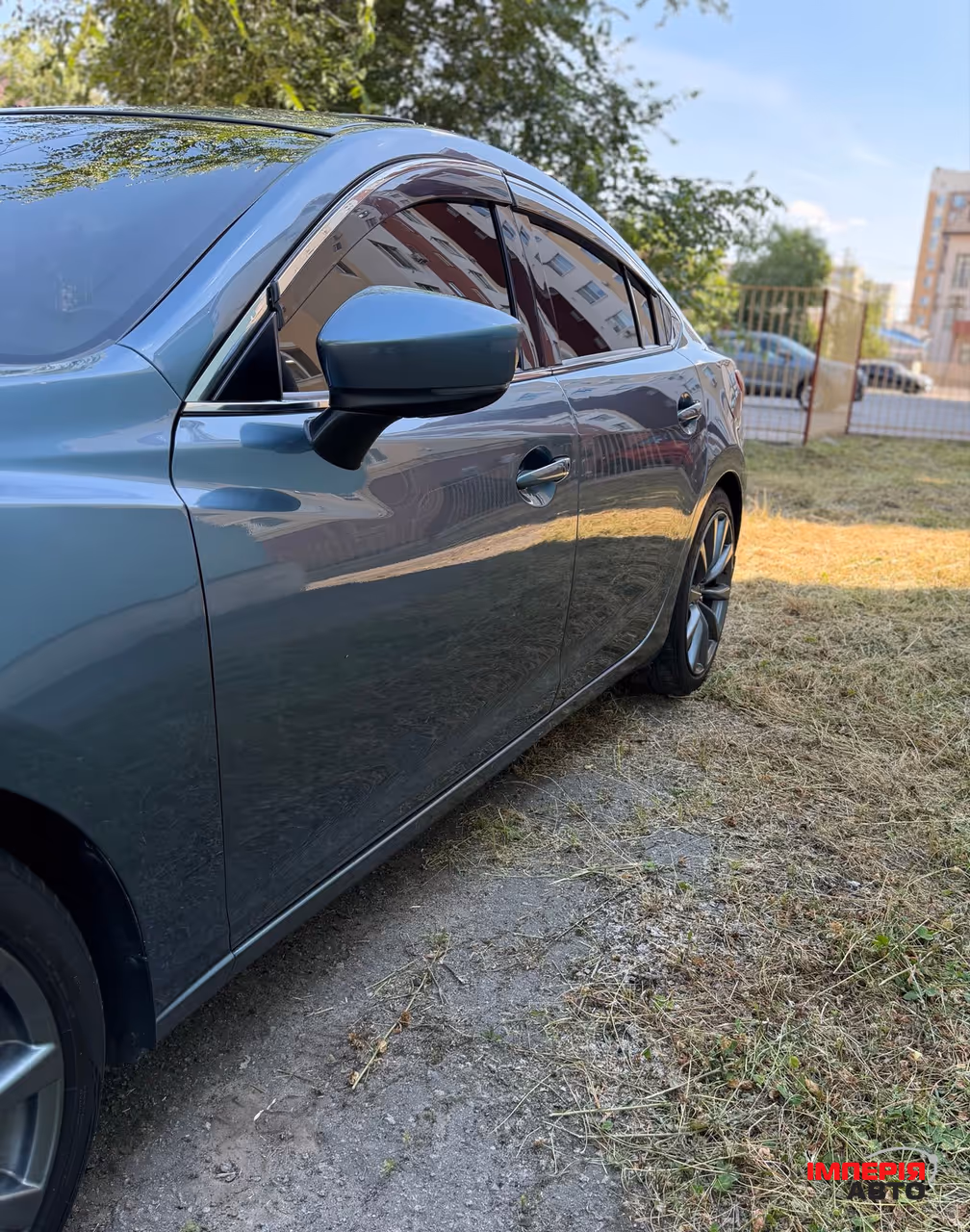 Mazda 6 - фото 11