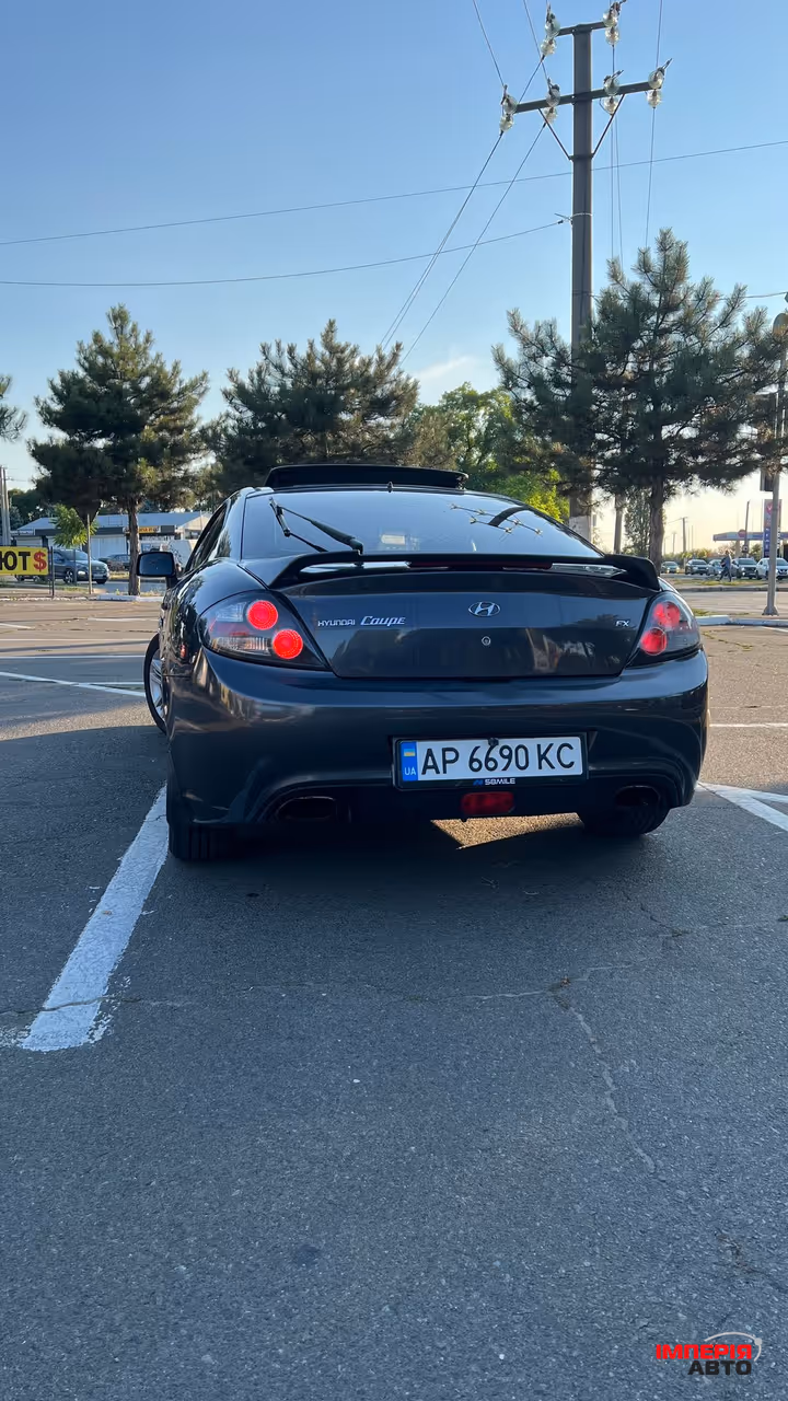Hyundai Coupe - фото 7