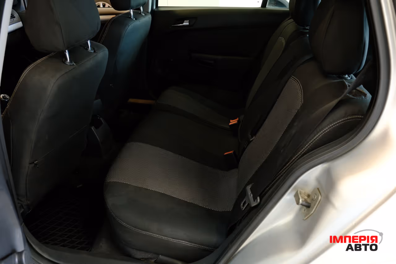Opel Astra - фото 8