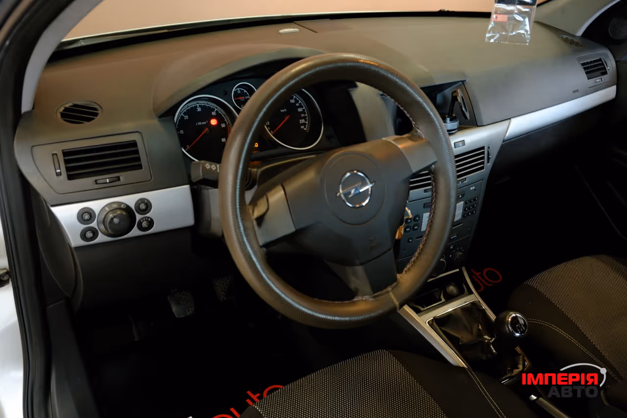 Opel Astra - фото 7