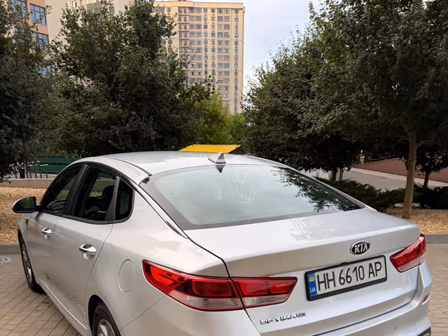 Kia Optima - фото 5