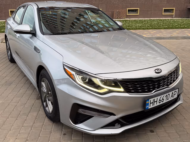 Kia Optima - фото 1