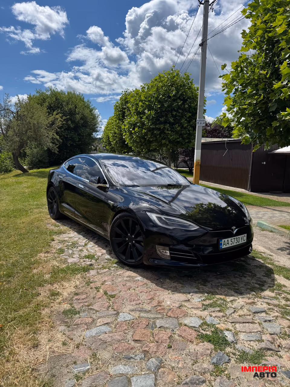 Tesla Model S - фото 1