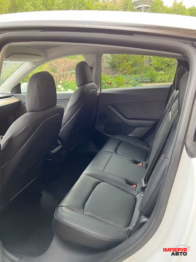 Tesla Model Y - фото 11