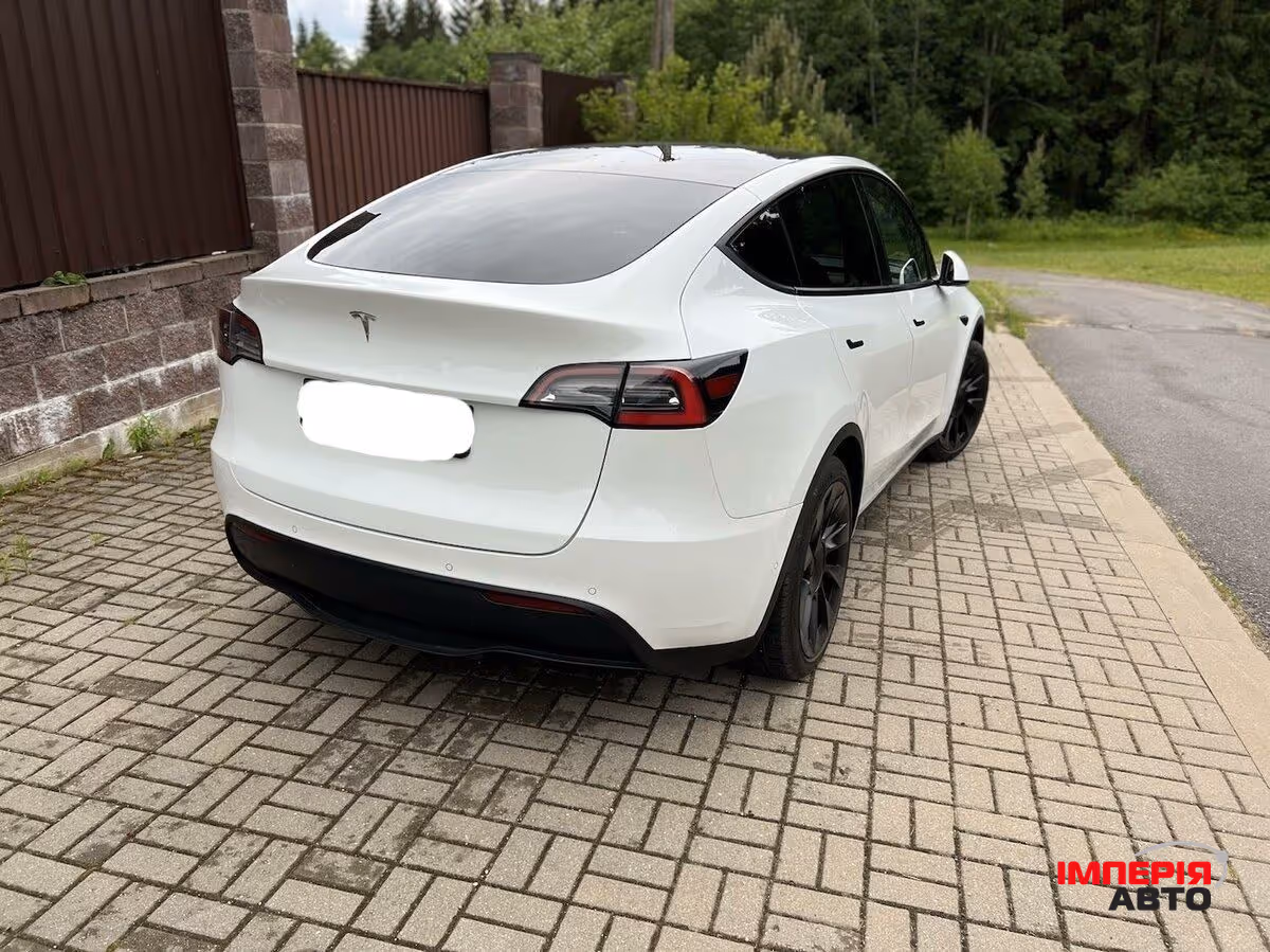 Tesla Model Y - фото 10