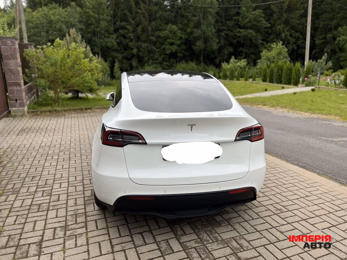 Tesla Model Y - фото 8
