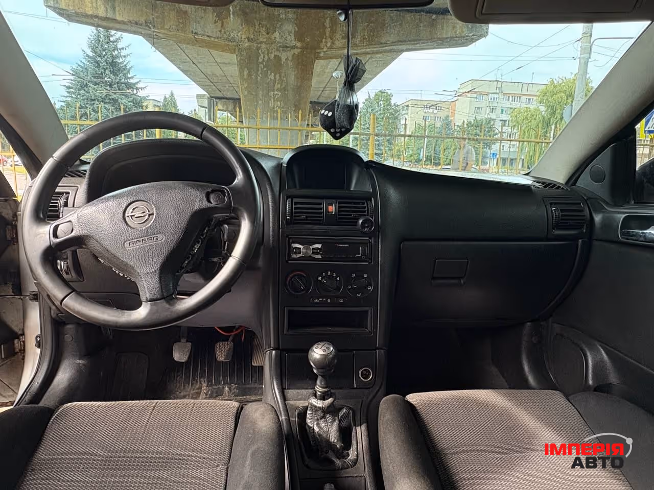 Opel Astra - фото 8