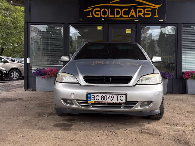 Opel Astra - фото 1