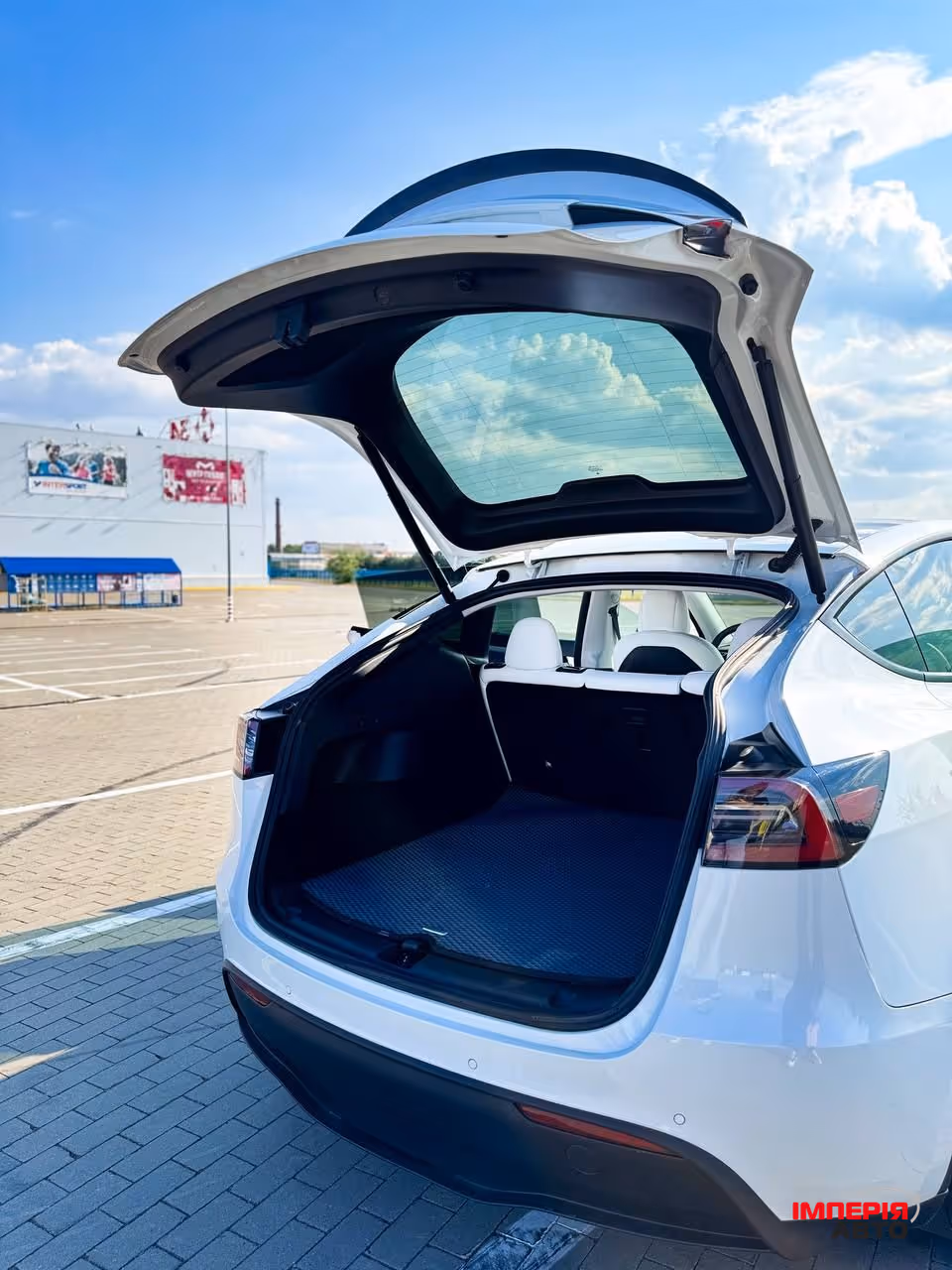 Tesla Model Y - фото 11