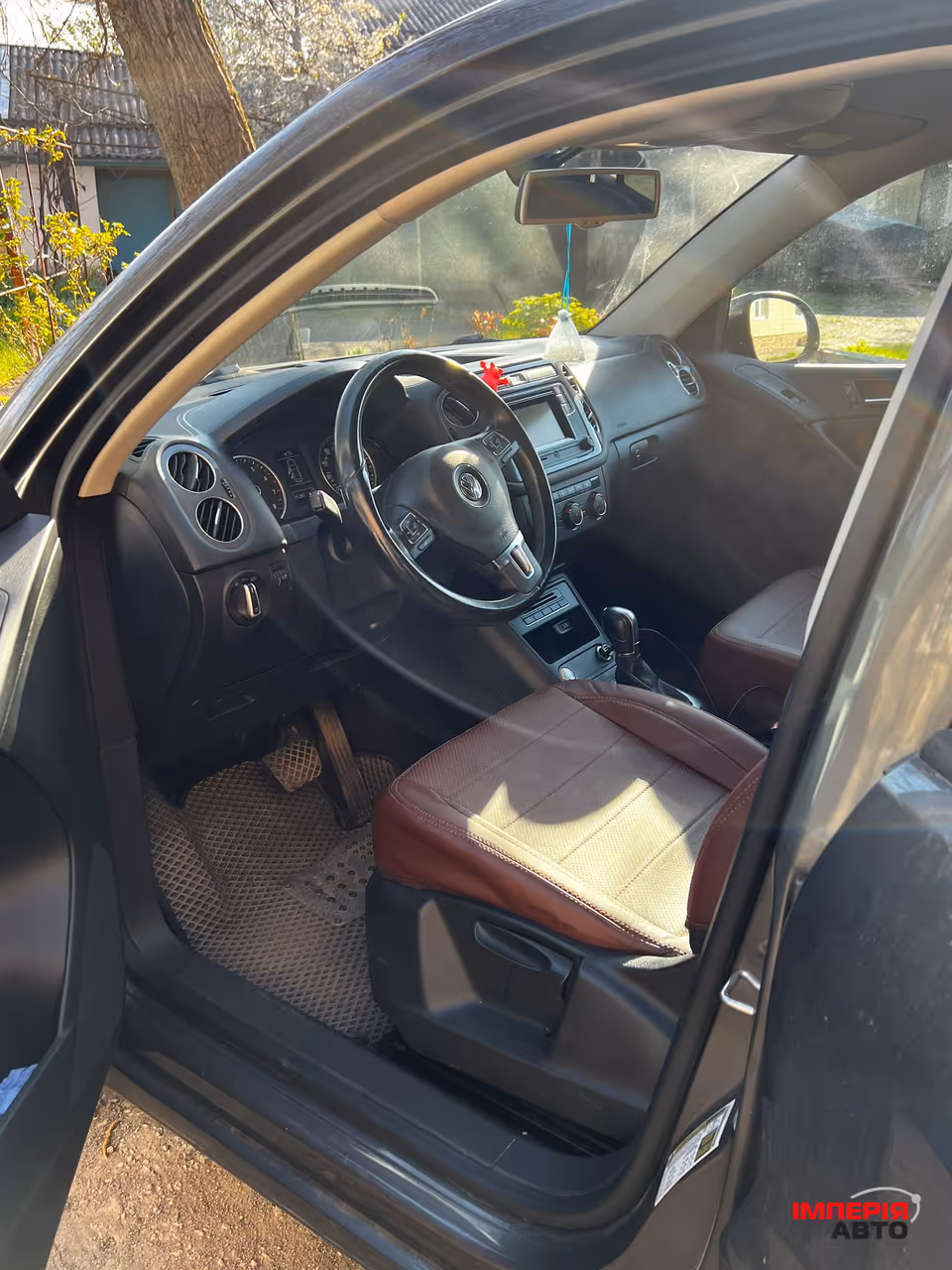 Volkswagen Tiguan - фото 13