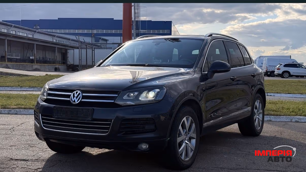Volkswagen Touareg - фото 1