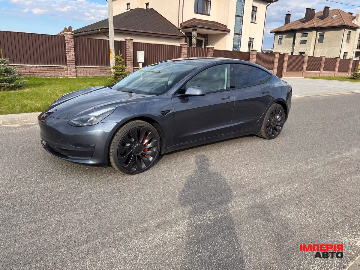 Tesla Model 3 - фото 12