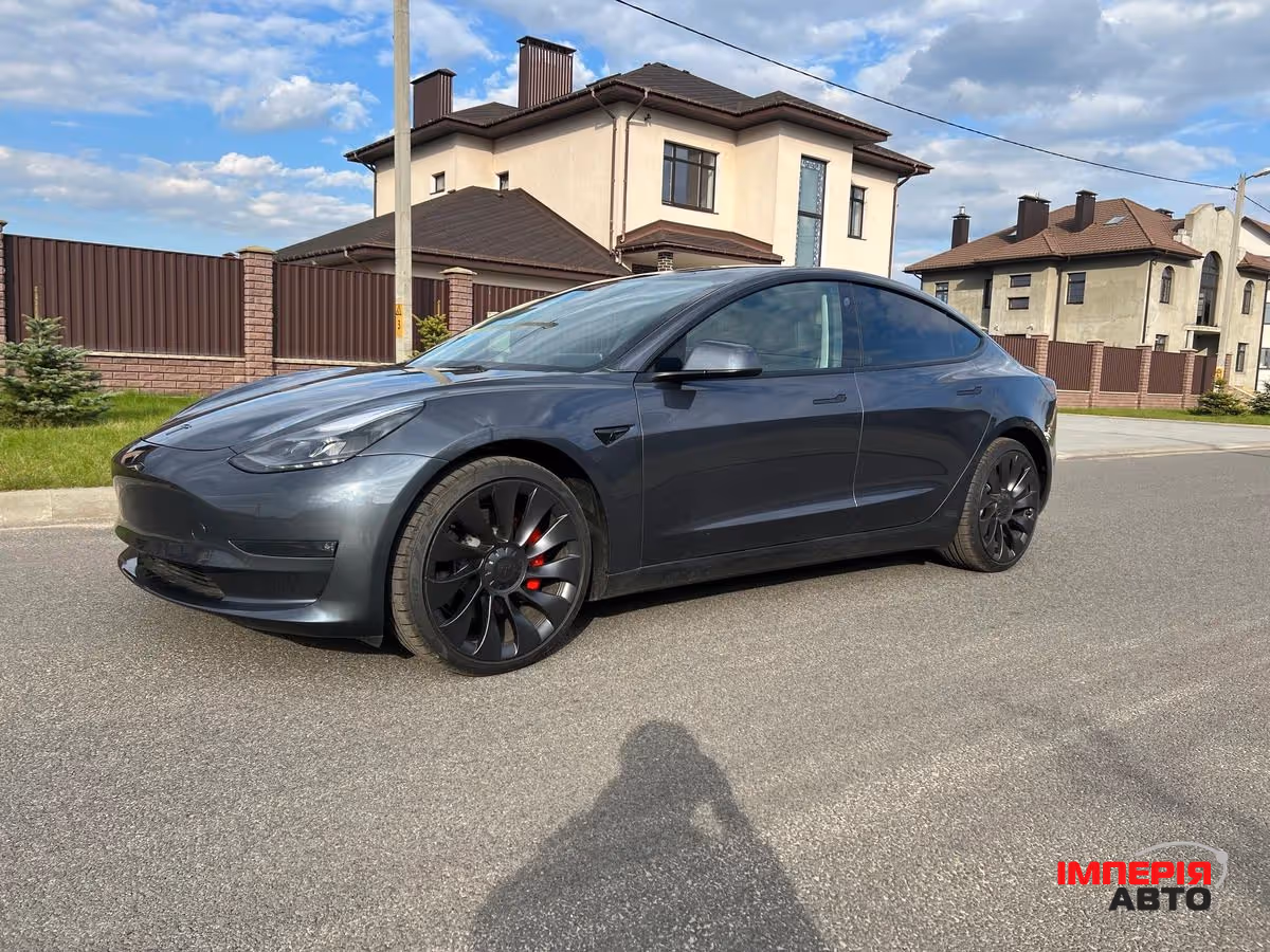 Tesla Model 3 - фото 11
