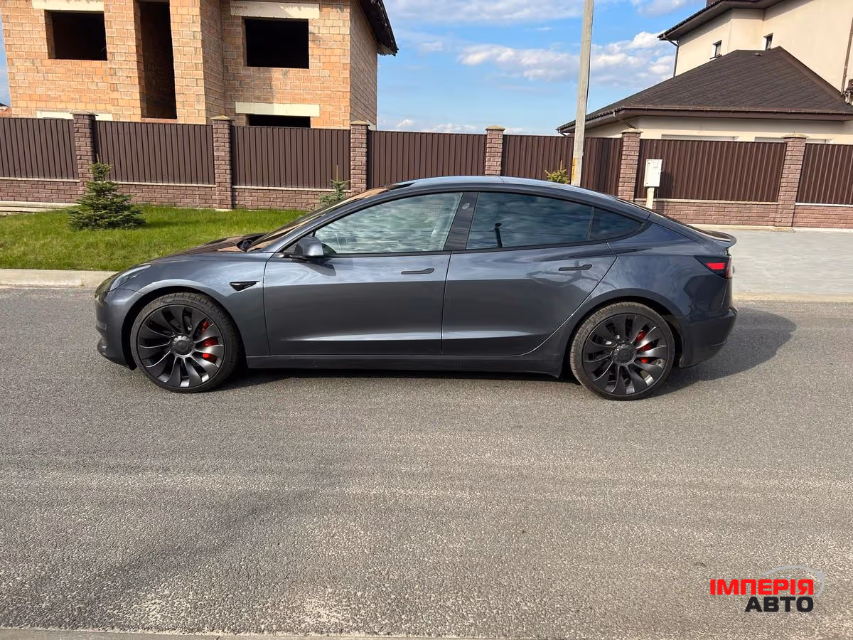 Tesla Model 3 - фото 9