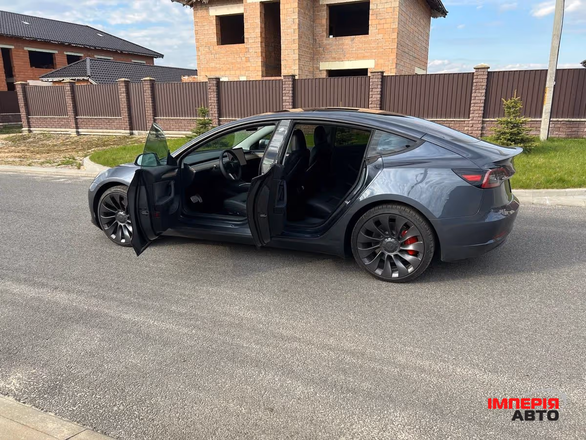Tesla Model 3 - фото 10