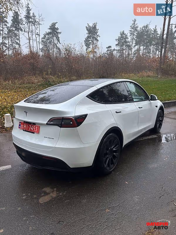 Tesla Model Y - фото 8