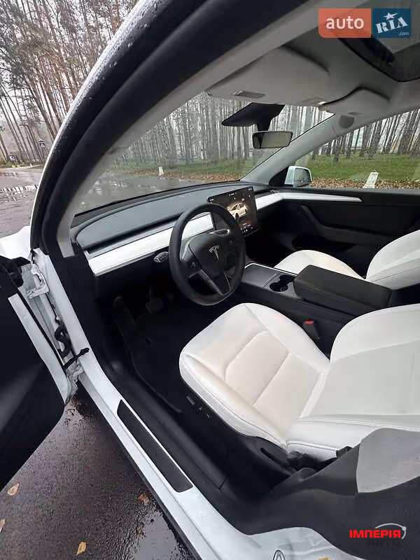 Tesla Model Y - фото 14