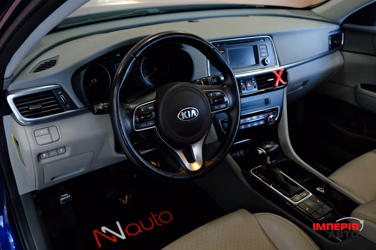 Kia Optima - фото 7