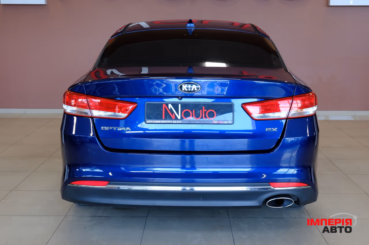 Kia Optima - фото 6