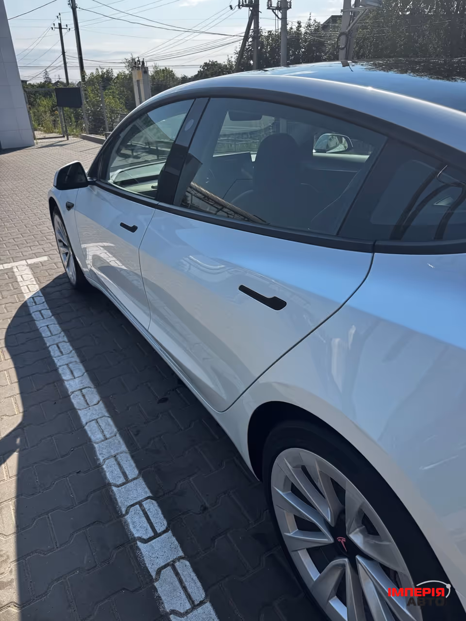 Tesla Model 3 - фото 10