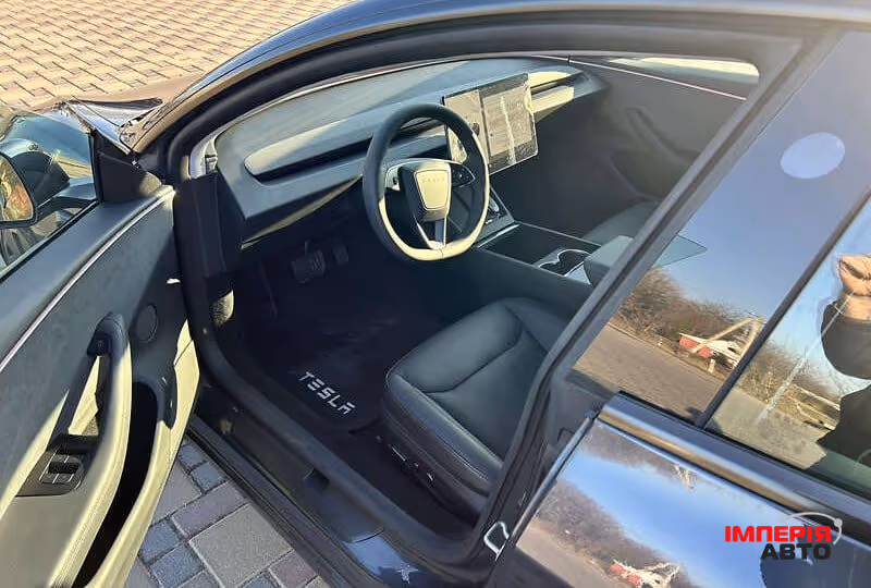 Tesla Model 3 - фото 10