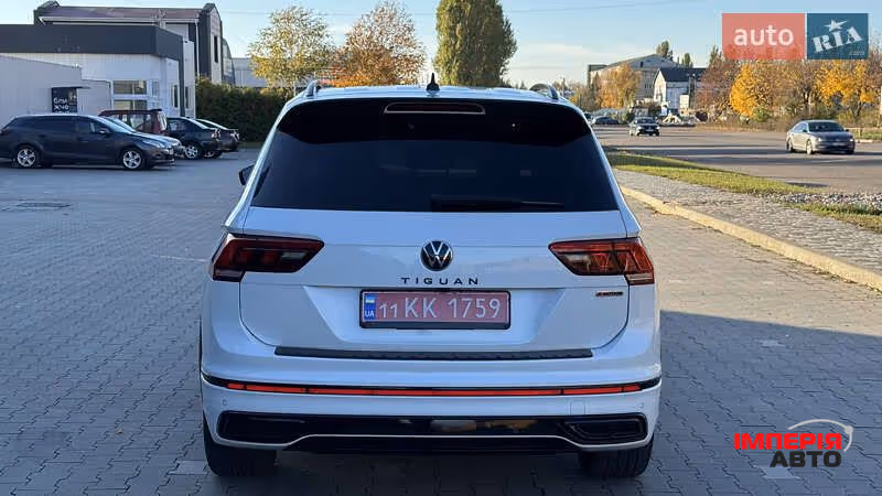 Volkswagen Tiguan - фото 11