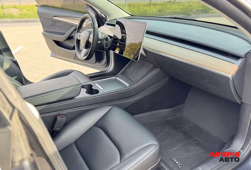Tesla Model 3 - фото 11
