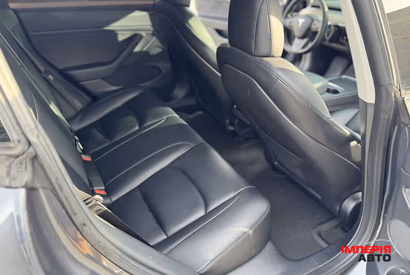Tesla Model 3 - фото 9