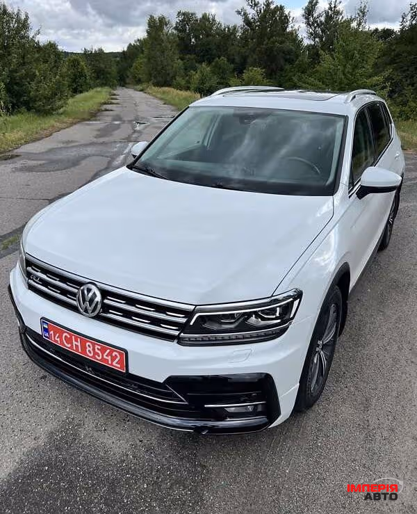 Volkswagen Tiguan - фото 11