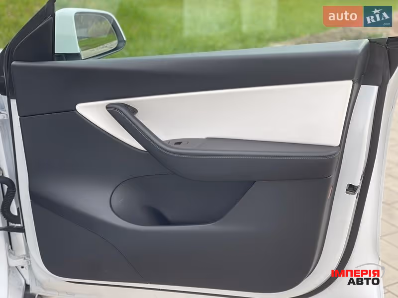 Tesla Model Y - фото 35