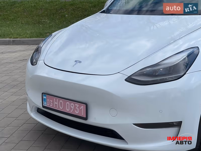 Tesla Model Y - фото 8