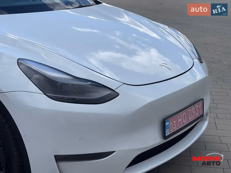 Tesla Model Y - фото 12