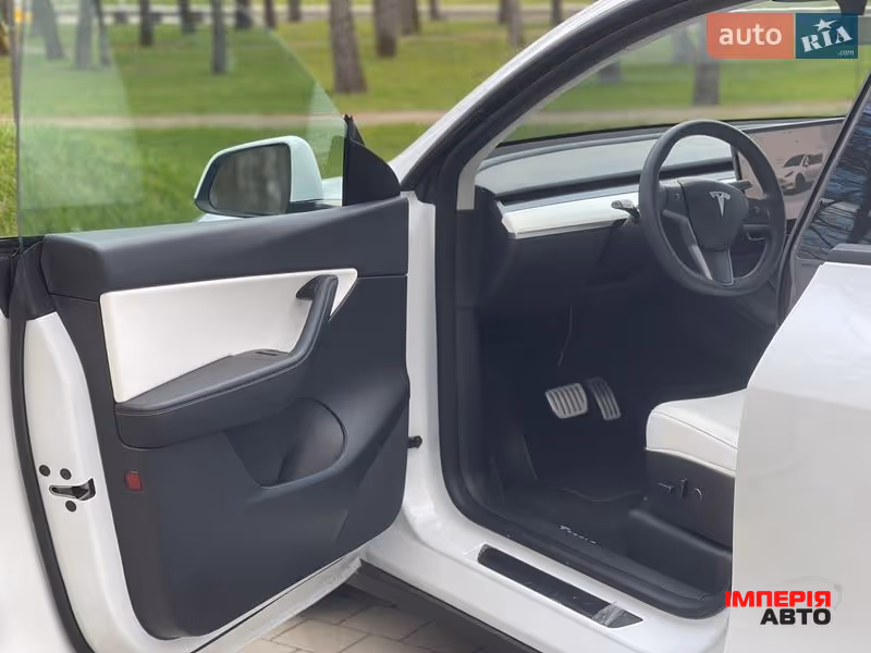 Tesla Model Y - фото 24