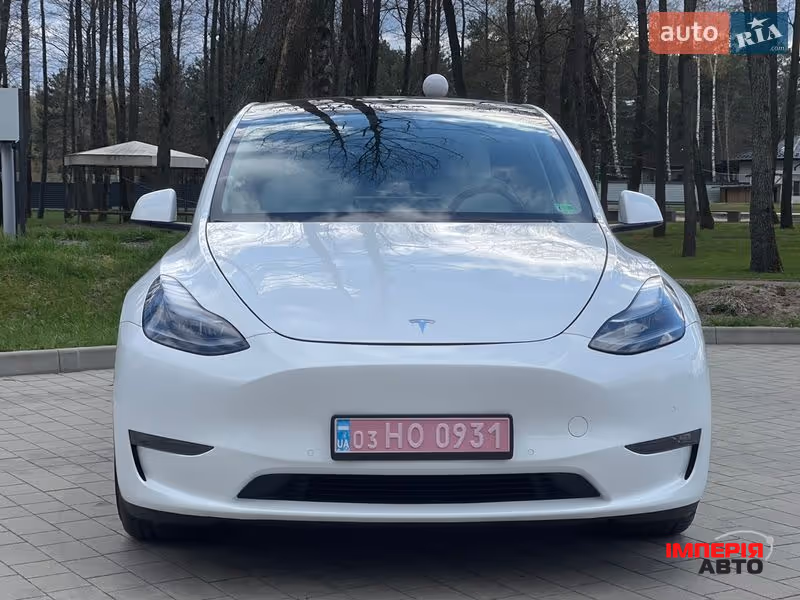 Tesla Model Y - фото 7